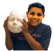 Boy wholding his face casting